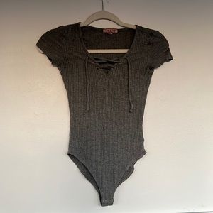 Gray body suit